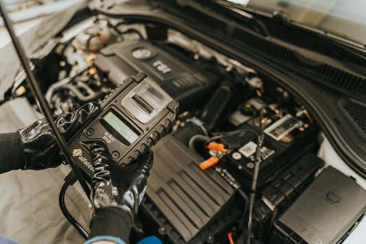 A Service Manager Asked: "Can a Portable Jump Starter Really Handle a Dead AGM Battery in a Display Vehicle?" — The Full Answer
